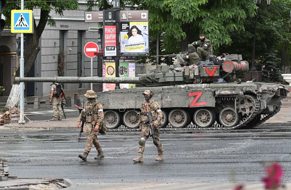 PHOTO: Fighters of Wagner private mercenary group are deployed in a street near the headquarters of the Southern Military District in the city of Rostov-on-Don, Russia, June 24, 2023.
