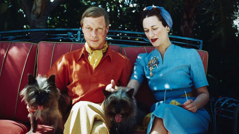 The Duke and Duchess of Windsor seated outdoors with two small dogs in an undated photo.
