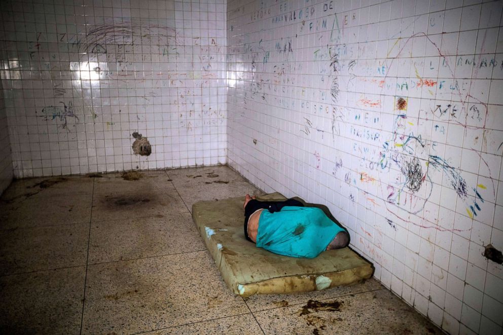 PHOTO: A mental health patient lies on a dirty mattress at the Caracas Psychiatric Hospital, in Caracas, Venezuela, July 14, 2019.