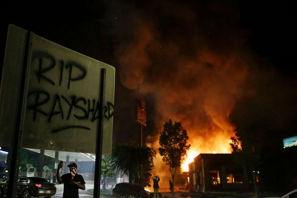 PHOTO: Flames engulf a Wendy's restaurant during protests in Atlanta, June 13, 2020. The restaurant was where Rayshard Brooks was shot and killed by police the previous evening.