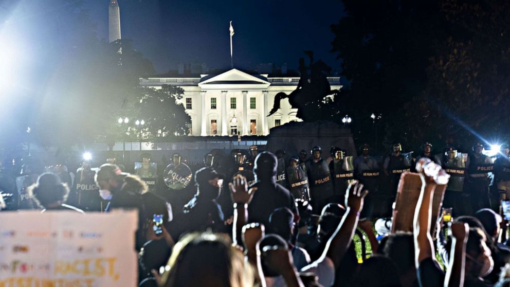 PHOTO: People gather outside the White House during a protest over the death of George Floyd, who died in police custody, in Washington, May 31, 2020.