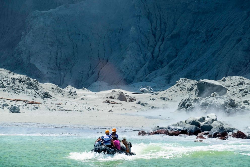 PHOTO: This photo taken on Dec. 9, 2019, provided by Michael Schade, shows a rescue boat leaving White Island, New Zealand, following the eruption of the volcano.