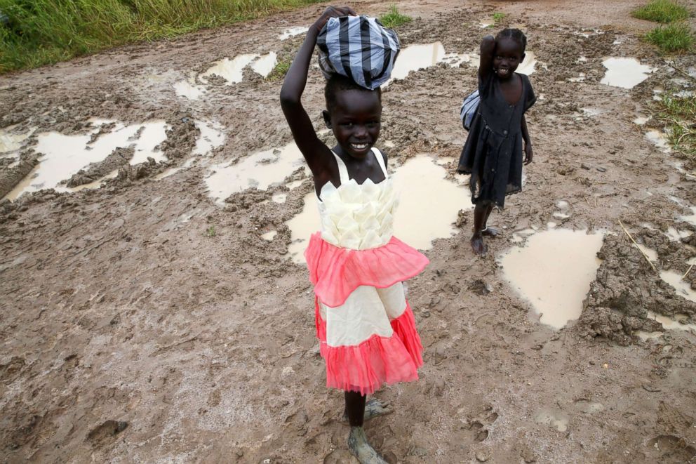 PHOTO: South Sudanese girls walk in the town of Malakal, in the  Upper Nile state of South Sudan, Sept. 8, 2018.