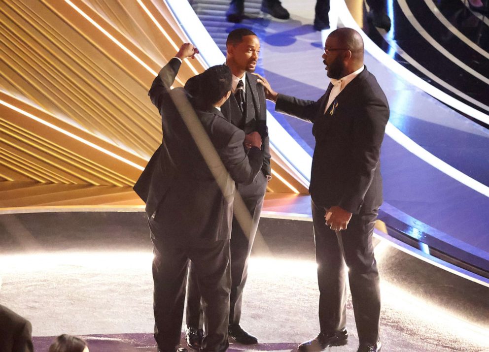 PHOTO: Denzel Washington and Tyler Perry comfort Will Smith during the show at the 94th Academy Awards at the Dolby Theatre, on March 27, 2022, in Los Angeles.