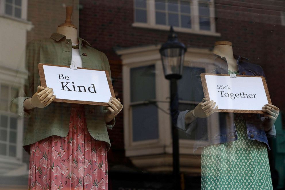 PHOTO: Messages of support are seen in a shop window in Windsor, England, March 24, 2020, during the coronavirus pandemic.