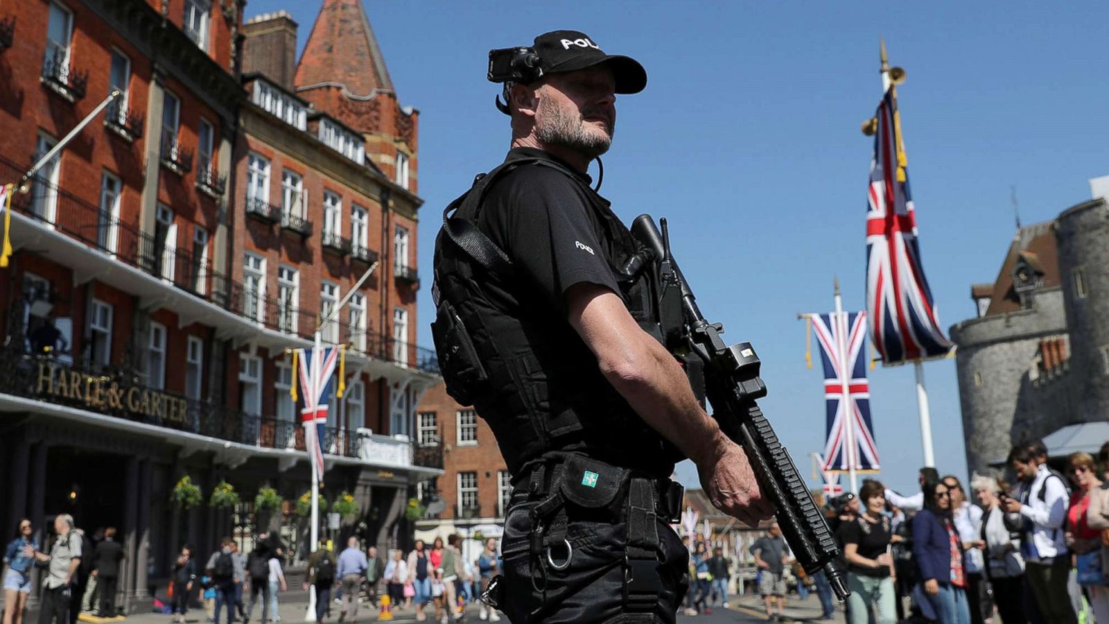 PHOTO: Armed police patrol ahead of the changing of the guard ceremony in Windsor, England, May 15, 2018.