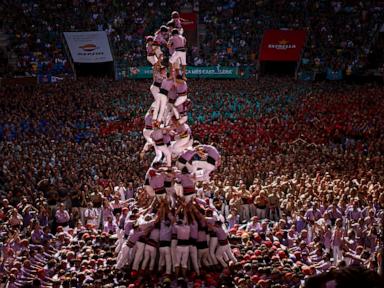 AP PHOTOS: Human towers rise skyward in Spain's Catalonia as part of cultural pride