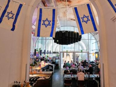A Vienna cafe offers a welcome for Israel supporters as tensions brew at the Eurovision Song Contest
