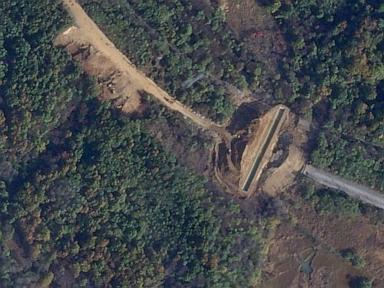 Satellite images show North Korea dug large border trenches after demolishing road, rail links