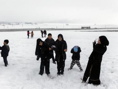 Late snowstorms batter South Africa's coast and leave 2 people dead