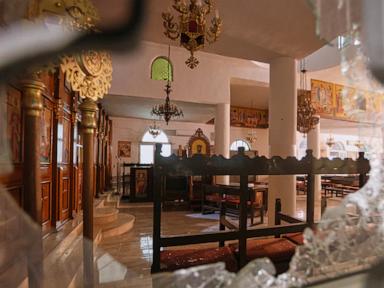 Survivor of deadly attack on Jordan church describes people crawling for their lives
