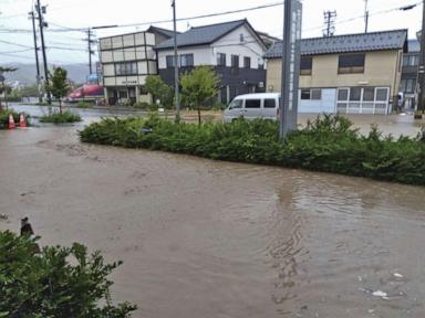 Rescue workers search for at least 6 people missing after heavy rain pounds Japan’s Noto region