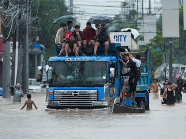 Storm floods northern Philippine regions, disrupting schools, work and travel