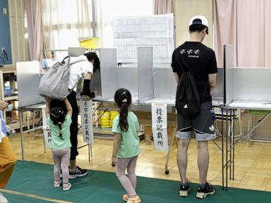 Voters in Tokyo cast ballots to decide whether to reelect incumbent conservative as city's governor