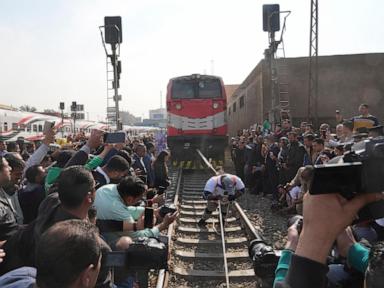 He can pull a train by the strength of his teeth. An Egyptian wrestler sets 3 world records