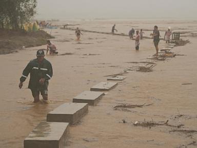 Typhoon batters storm-weary Philippines and displaces thousands more people as a new storm threatens