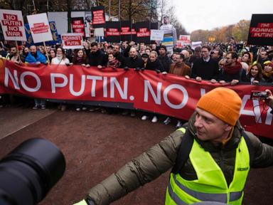 Putin critics lead a march in Berlin calling for democracy in Russia and an end to war in Ukraine