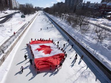 Defiant Canadians mark their flag's anniversary as Trump hopes to make their country a state