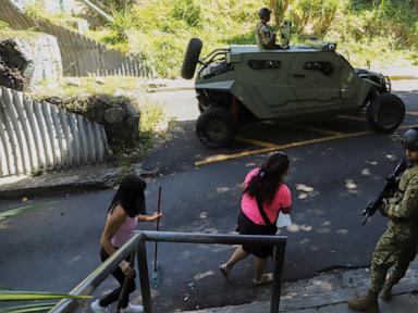 Thousands of soldiers fence off a Salvadoran neighborhood in pursuit of gang remnants