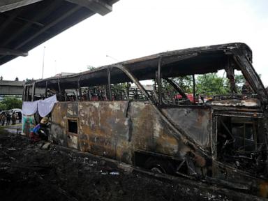 Operator of a Thai bus that caught fire and killed 23 is charged, as investigators suspect gas leak