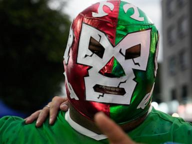 Masked wrestlers flood Mexico’s World Cup streets as fans embrace lucha libre fever