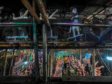 AP PHOTOS: Artisans in India’s Assam state make colorful mud idols of Hindu gods for Durga Puja