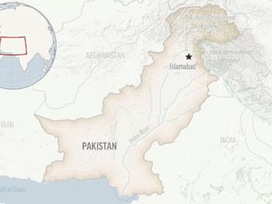 A roadside bomb in Pakistan kills 2 people and wounds 8