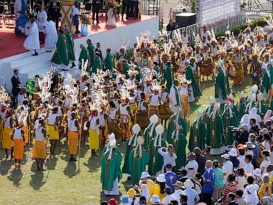 Pope arrives in the remote jungles of Papua New Guinea with a ton of humanitarian aid and toys