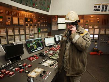 Ukrainian workers carry out repairs despite Russia's pounding on country's power grid