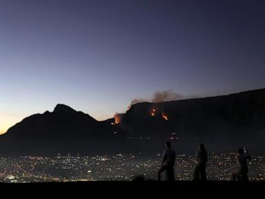 More than 100 firefighters battle blazes on South Africa's Table Mountain in Cape Town