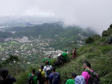 At one of Rio de Janeiro's hardest trails, a paraplegic athlete climbed into clouds