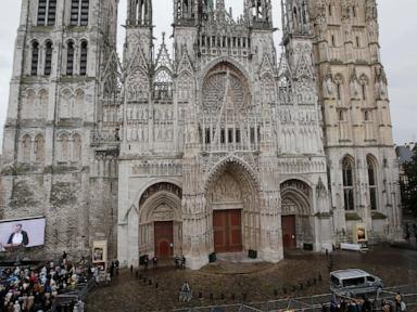 Fire in towering spire of medieval cathedral in French city of Rouen is under control