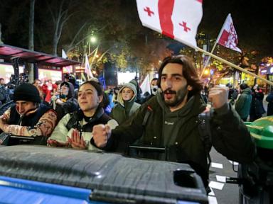 Police in Georgia's capital break up a tent camp set up by protesters demanding a new election