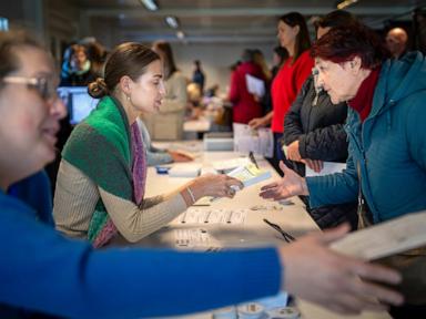 Lithuanians vote in parliamentary election with many looking for change despite a strong economy