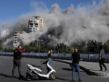 AP PHOTOS: Images capture the exact moments an Israeli bomb strikes a building in Beirut