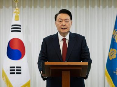 South Korean investigators seek to question reluctant president over martial law