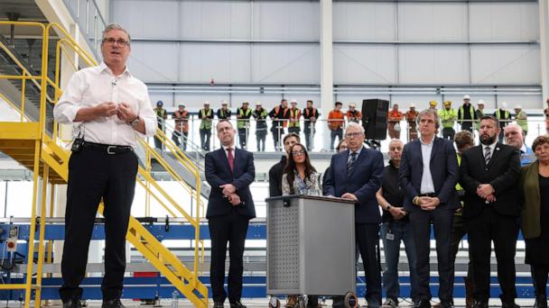 British Prime Minister Keir Starmer speaks to workers during a visit to Glass Futures in Saint Helens, Merseyside, England, Thursday May 29, 2025. (James Speakman/PA via AP)