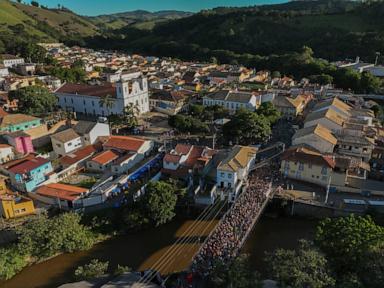 Families, revelers party side-by-side in traditional Carnival in Sao Paulo town