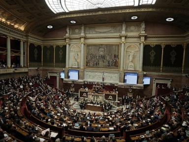 French lawmaker who uses a wheelchair wins a change in voting rules that discriminated against him