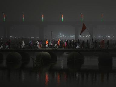 Millions of pilgrims and naked, ash-smeared ascetics take holy dips in India's mega Hindu festival