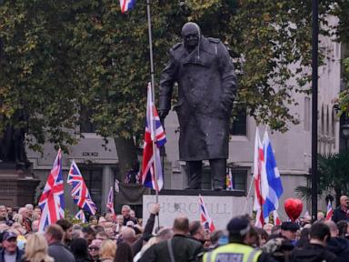 Supporters of far-right British figure rally as anti-racism demonstrators mount counter-protest