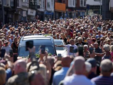 Bonnie Tyler fans line the streets of a Welsh village as her coffin is brought home