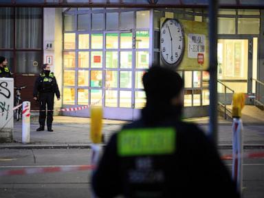 Berlin police say they have detained a man who attacked 2 people with a knife