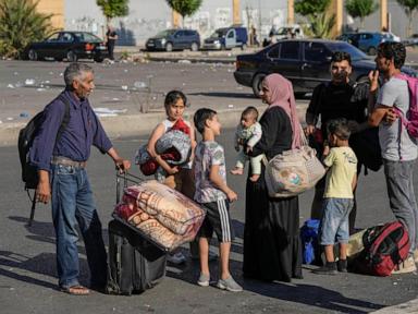 Hundreds of fleeing families sleep on beaches and streets after Israel's strikes shake Beirut