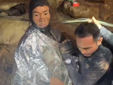 Rescuers work to drain flooded Laos cave to free 5 villagers, search for 2 missing