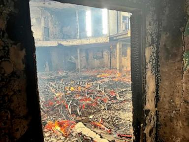 Liberia's parliament building catches fire as anti-government protests enter a second day