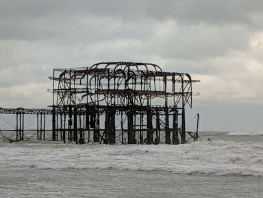 Part of famous Brighton pier collapses as Atlantic storms sweep into England