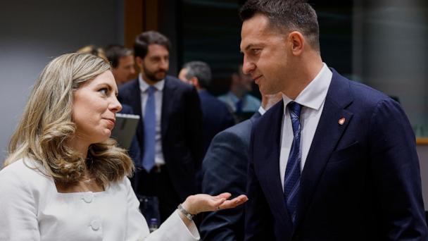 Polish Minister for the European Union Adam Szlapka, right, speaks with Sweden's Minister for European Union Affairs Jessica Rosencrantz during a meeting of the general affairs ministers at the European Council building in Brussels, Tuesday, May 27, 2025. (AP Photo/Omar Havana)