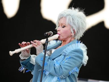 AP Photos: Music fans attend the Glastonbury Festival in England