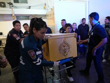 Families retrieve bodies after at least 7 killed in shooting outside Bangkok